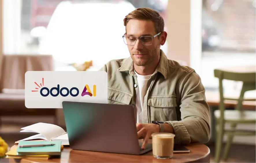 Man working on Odoo AI on laptop